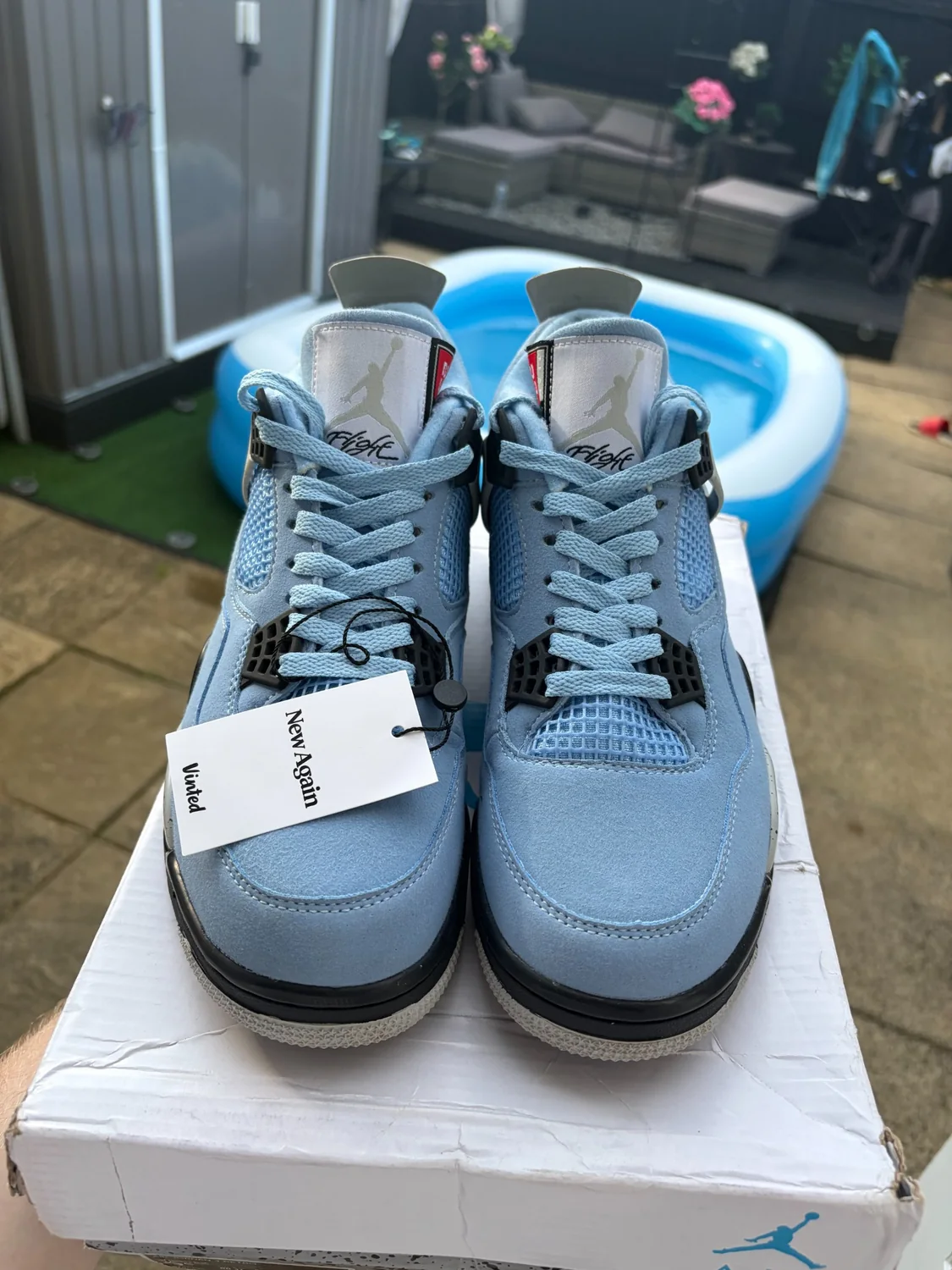 Jordan 4 Retro University Blue front view