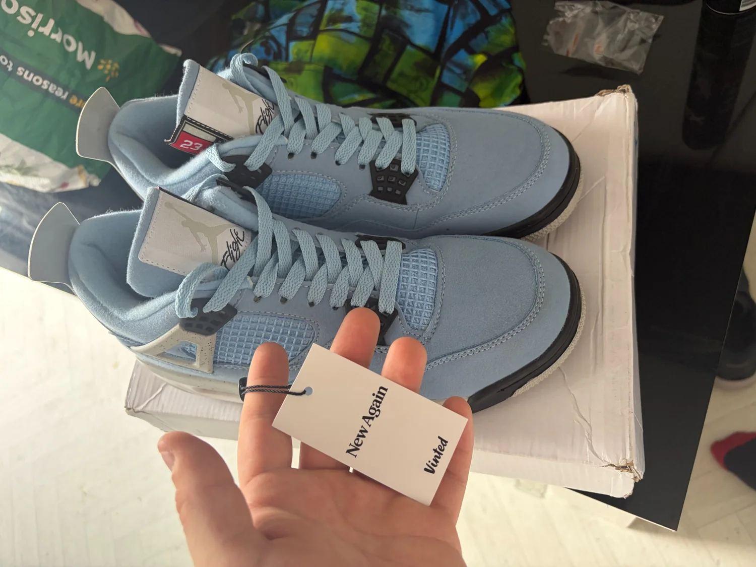 Jordan 4 Retro University Blue Vinted tag